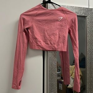 gymshark pink cropped long sleeve workout top